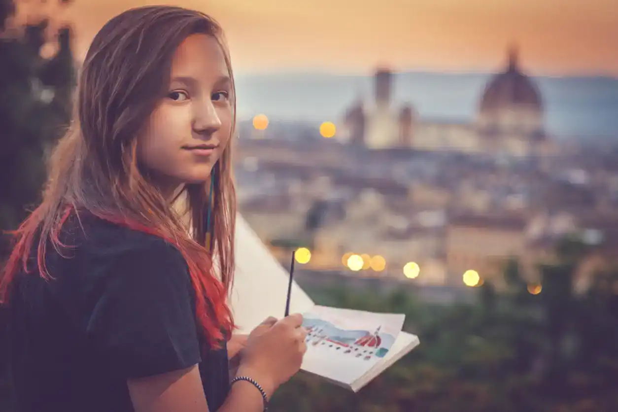 Young artist drawing Florence, Italy