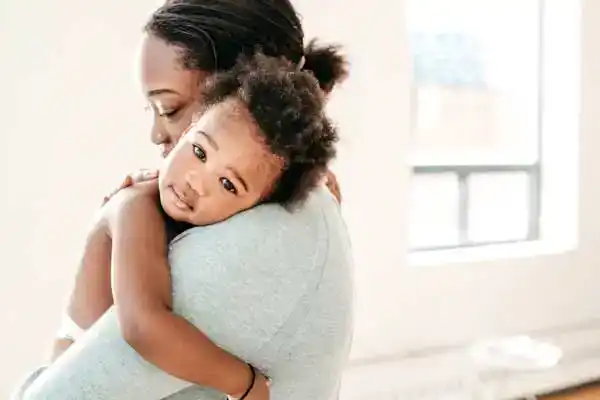 Mom holding her child