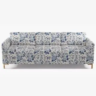 sofá floral azul e branco