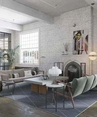 Sala cinza com paredes de tijolos aparentes
