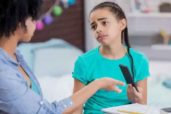 mom punishing daughter by taking phone