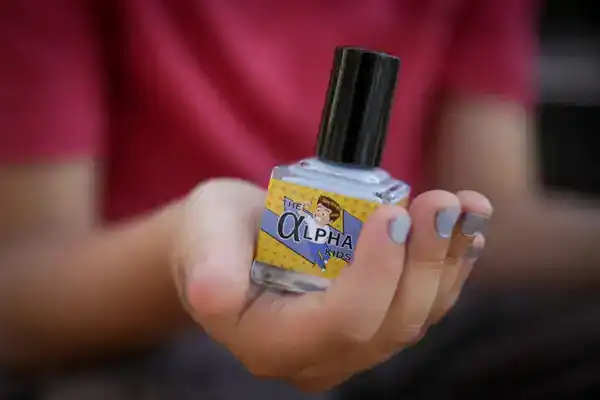 Boy wearing nail polish