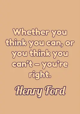 Two people working on a laptop and laughing about something.