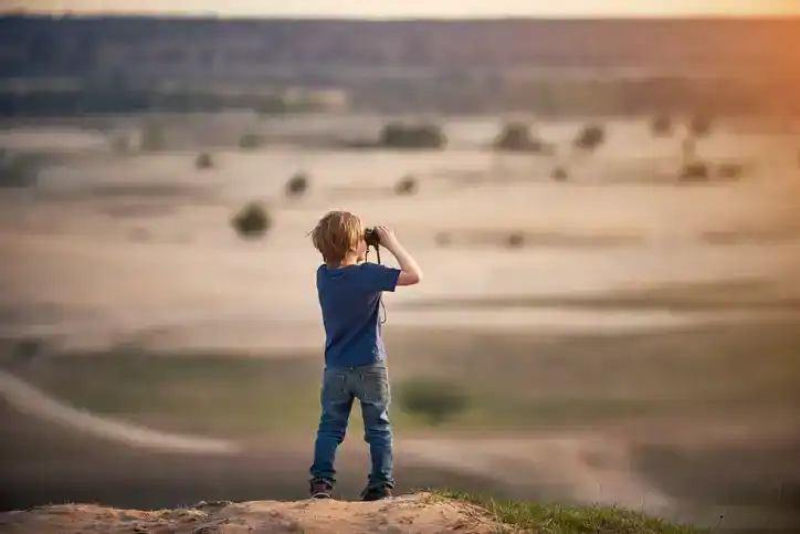 little boy in desert