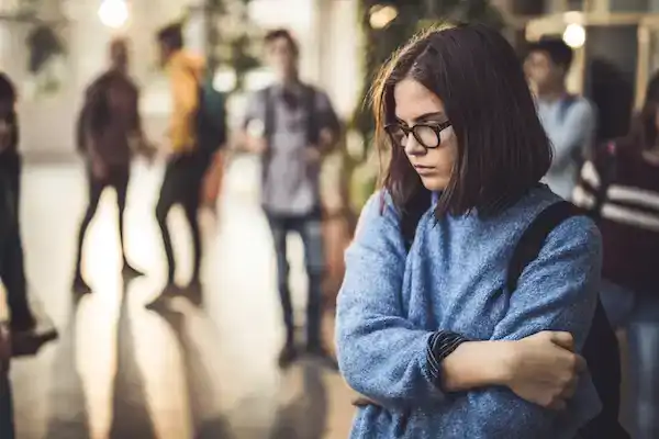 Hothouse teenager feeling nervous at school