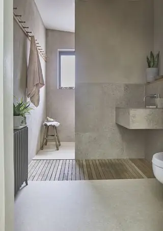 banheiro neutro com piso de vinil, estilo minimalista, área úmida ao fundo