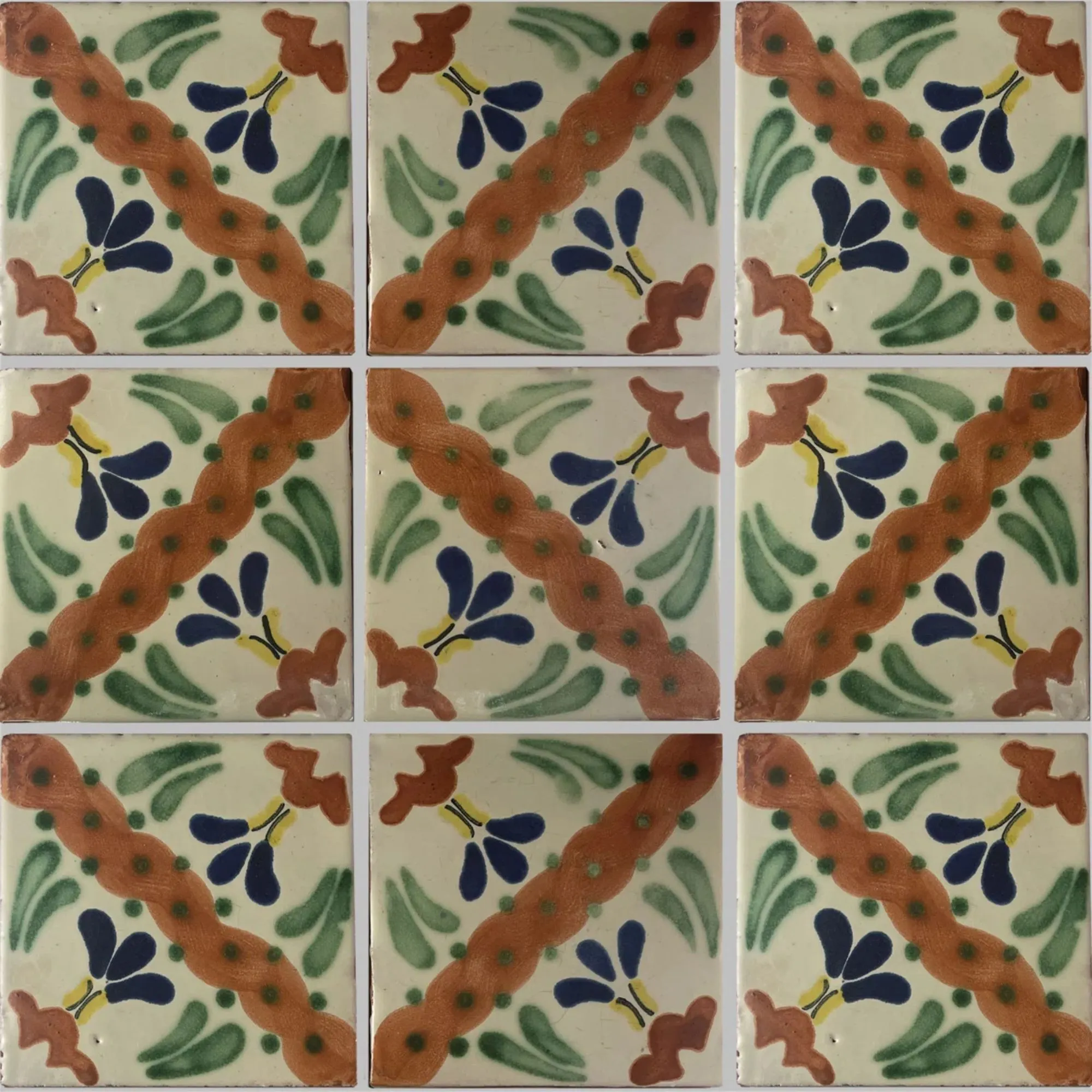 Grün-orange und blau gemusterte Fliesen' loading='lazy' title=