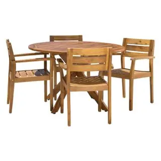 Un juego de comedor redondo para exteriores Renaud para 4 personas