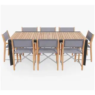 Una mesa de comedor extensible para exteriores de teca y aluminio