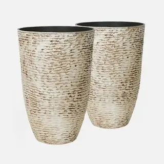 Par de jardineras de piedra beige