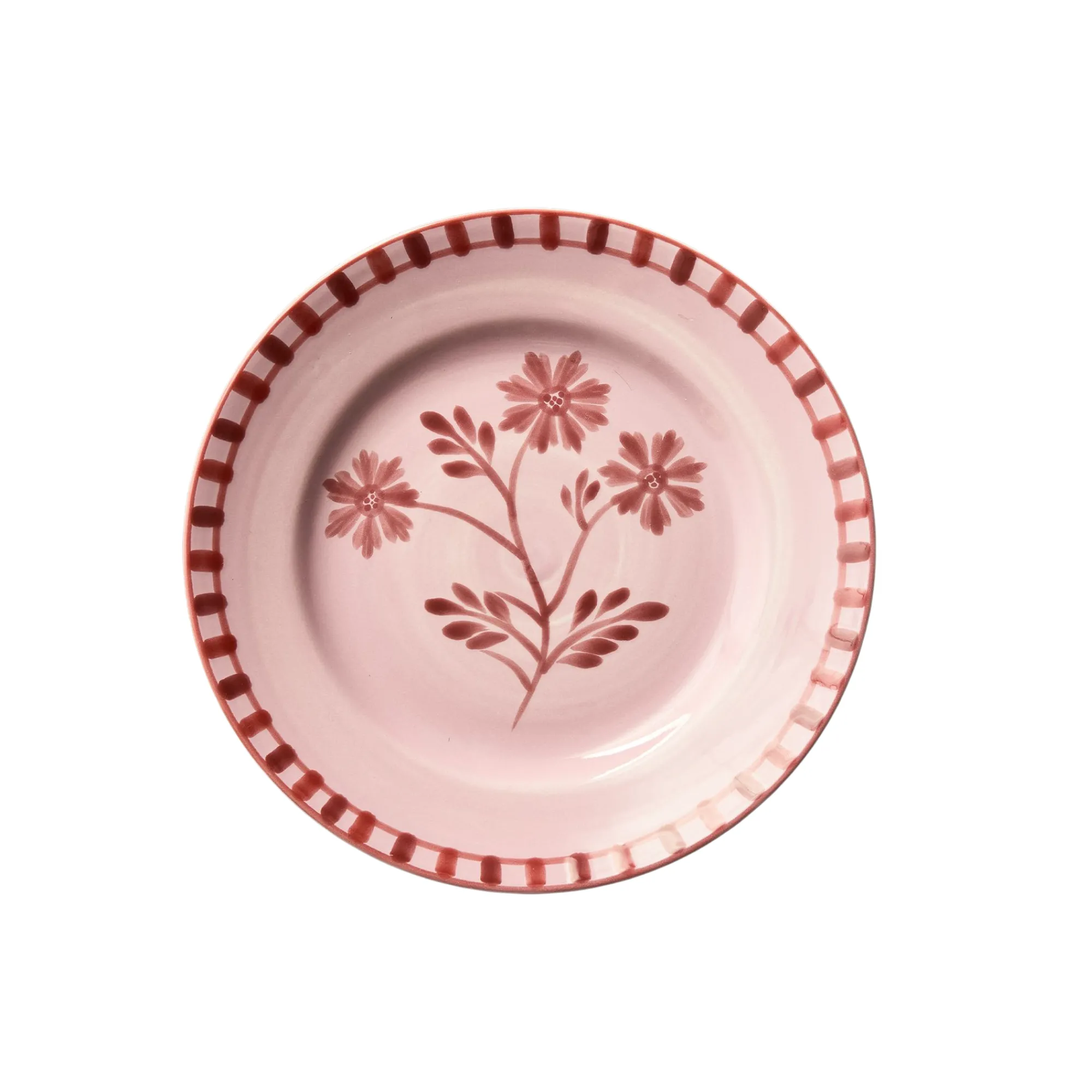 un plato rosa con un motivo floral' loading='lazy' title=