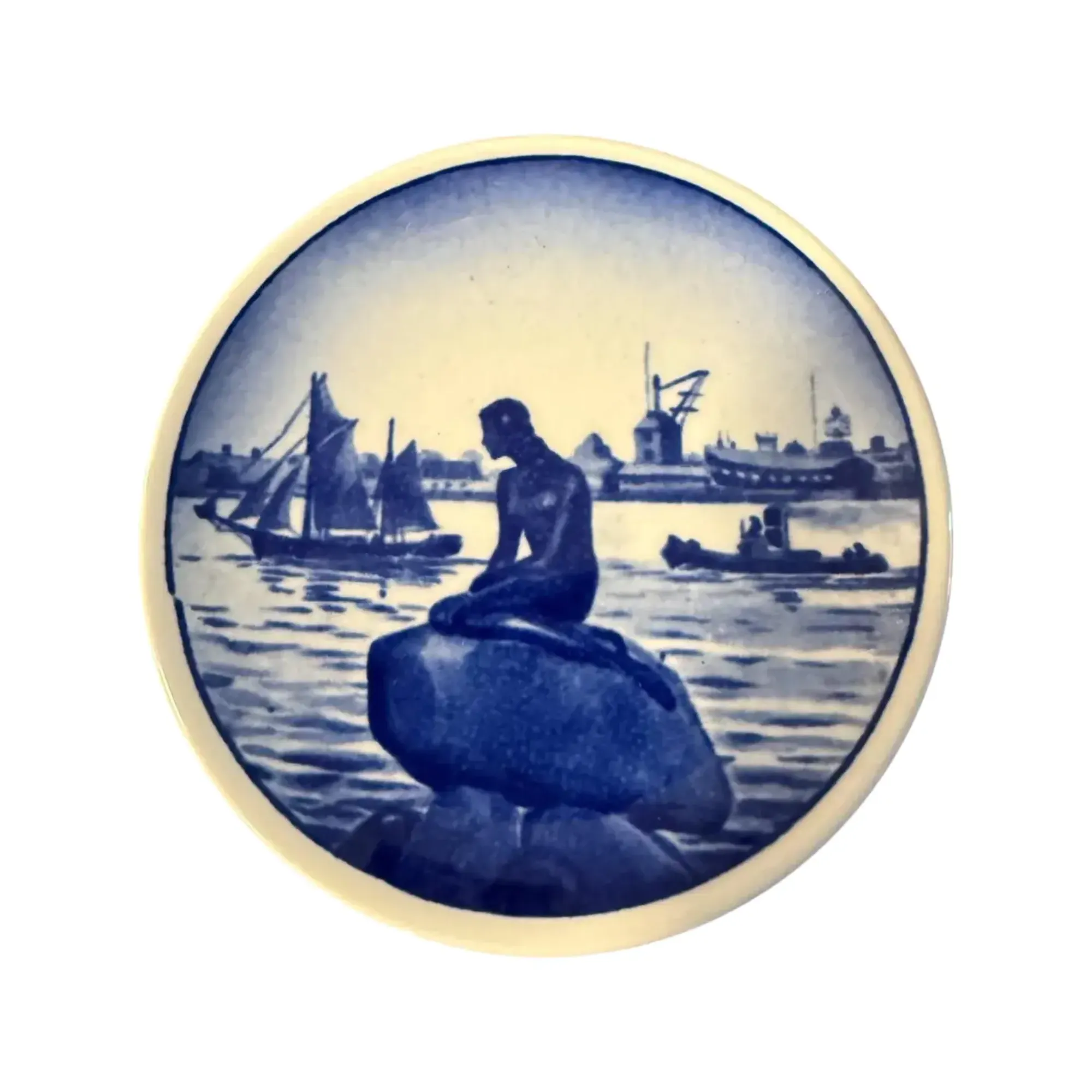 un plato azul y blanco de sirenita' loading='lazy' title=