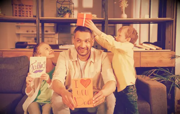 A dad having fun with his kids on Father