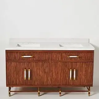 Deluxe Tamboured Vanity mot en grå bakgrunn.