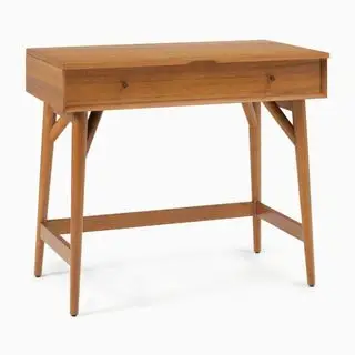 Bureau réglable West Elm sur fond blanc.