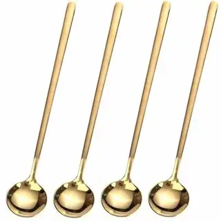 Quattro cucchiaini lunghi d'oro