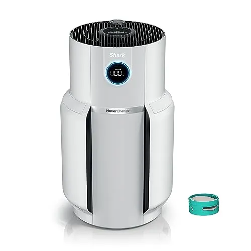 Un purificateur d'air cylindrique blanc avec un dessus de filtre noir et un petit écran numérique rond à l'avant.' loading='lazy' title=