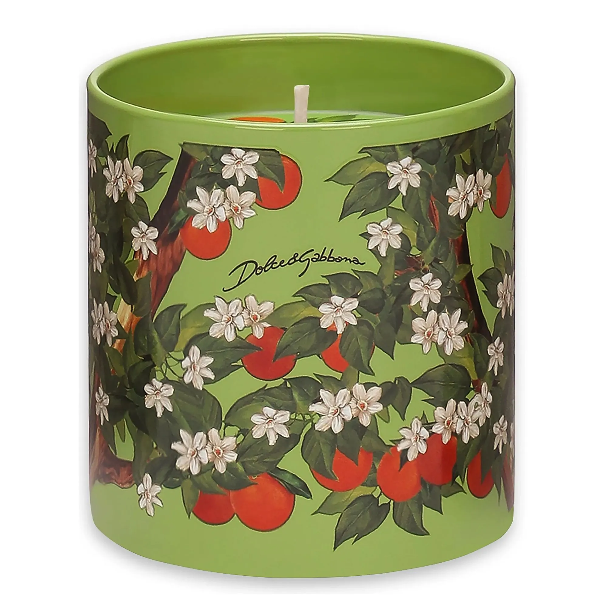 Eine grüne Kerze mit Mustern aus Blättern, Orangen und Jasminblüten.' loading='lazy' title=