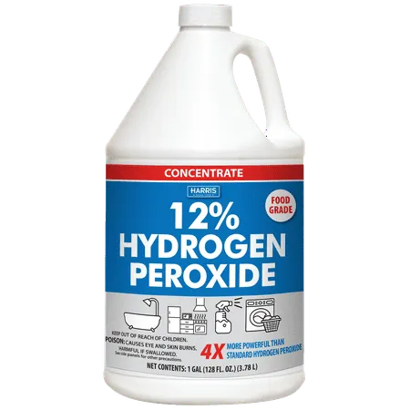 Una grande bottiglia bianca di perossido di idrogeno con un'etichetta blu e rossa.' loading='lazy' title=