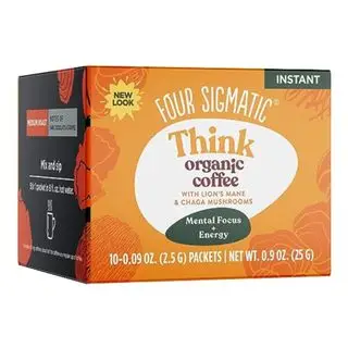 En oransje boks med Four Sigmatic Think Mushroom Coffee