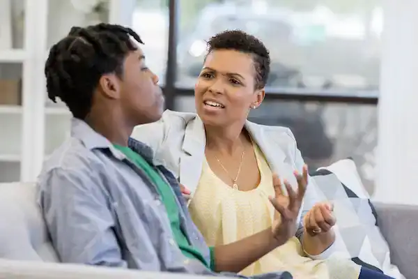 Mom Explaining Consequences Of Sexting To Son